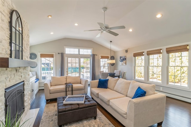 living room with dark wood-style flooring, a fireplace, lofted ceiling, recessed lighting, and a baseboard radiator