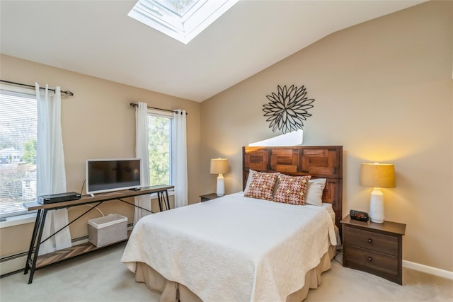 bedroom featuring a baseboard radiator, vaulted ceiling with skylight, baseboards, and light colored carpet