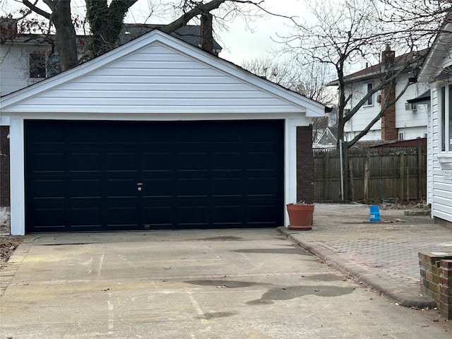 detached garage with fence