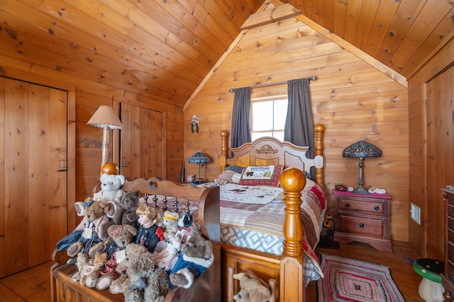 bedroom featuring lofted ceiling, wood walls, wooden ceiling, and wood finished floors