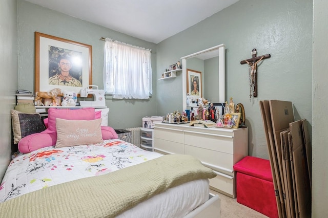 bedroom featuring light carpet