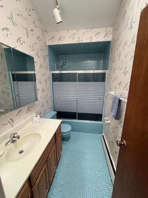 full bathroom featuring wallpapered walls, toilet, enclosed tub / shower combo, tile patterned flooring, and vanity