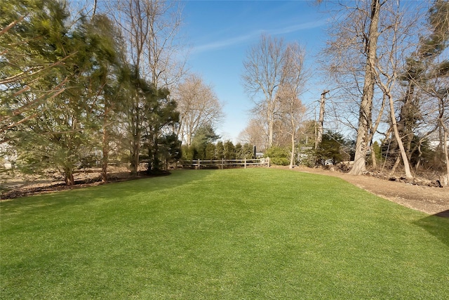 view of yard with fence