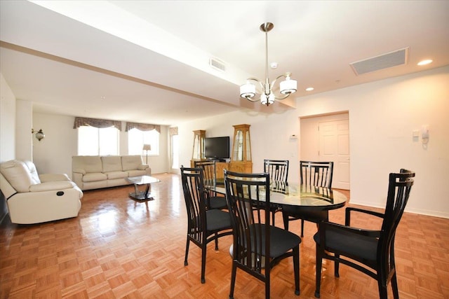 dining room with recessed lighting, visible vents, baseboards, and an inviting chandelier
