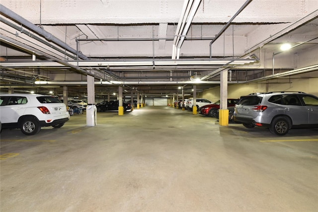 parking deck featuring a garage door opener