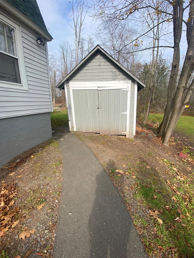 view of outbuilding with an outdoor structure