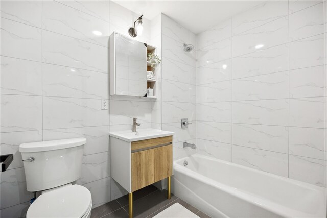 163-07 72nd Ave Unit 2A, Fresh Meadows, NY 11365 - full bathroom featuring shower / tub combination, vanity, tile walls, and toilet