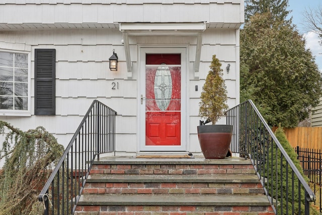 property entrance featuring fence