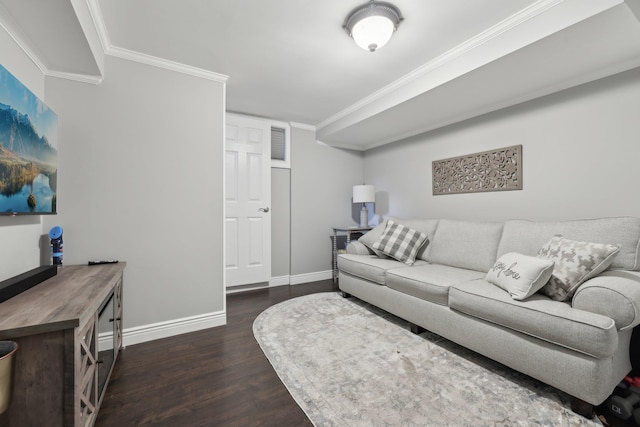 living room featuring visible vents, dark wood-type flooring, baseboards, and ornamental molding