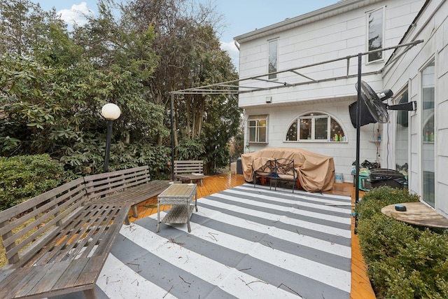 view of patio / terrace with a grill and a wooden deck