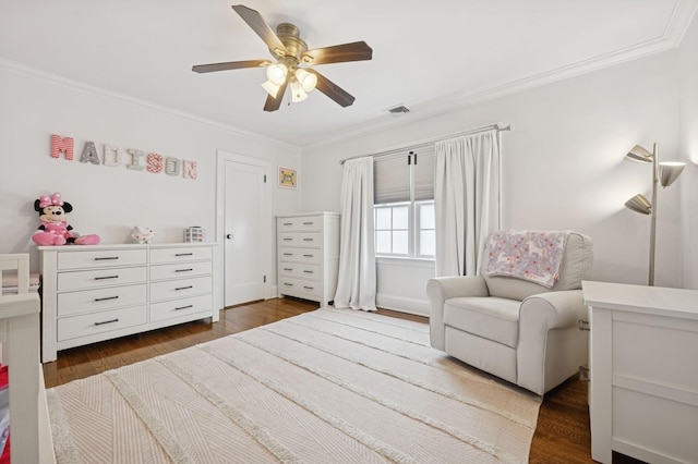 bedroom featuring dark wood-style floors, ceiling fan, visible vents, and crown molding