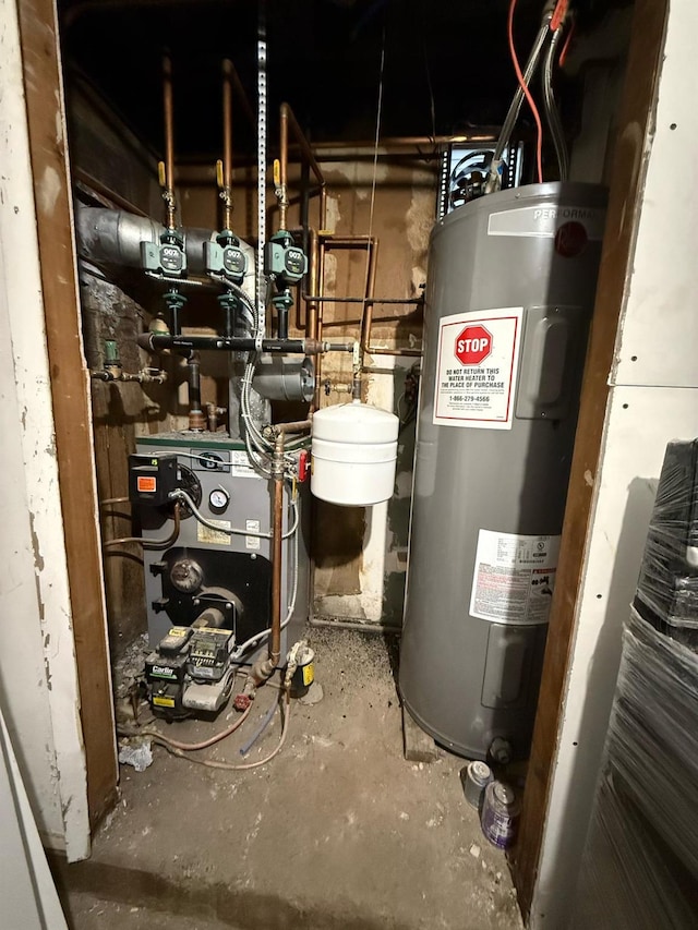 utility room with a heating unit and electric water heater