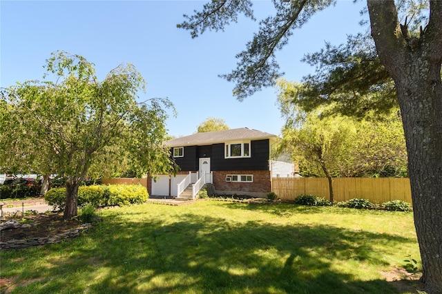 30 Bushwick Ave, Brentwood, NY 11717 - rear view of property featuring brick siding
