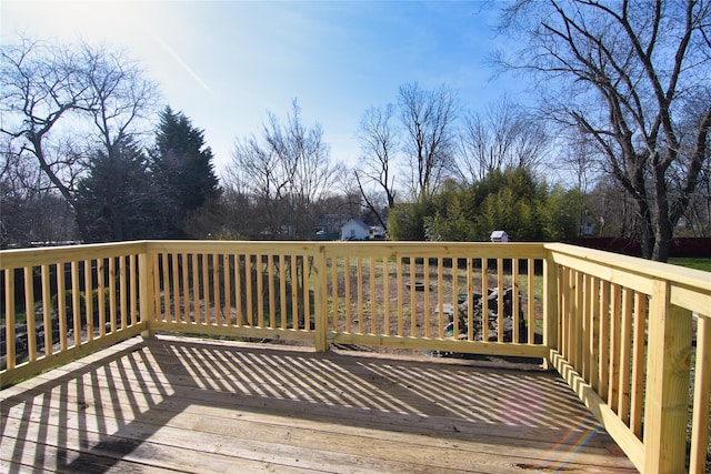 30 Bushwick Ave, Brentwood, NY 11717 - wooden terrace featuring view of wooded area
