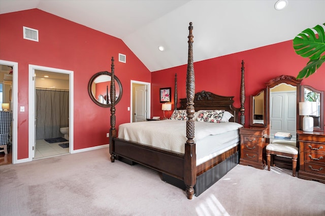 bedroom with visible vents, carpet flooring, ensuite bathroom, and baseboards