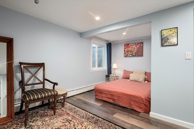 bedroom featuring baseboards, beam ceiling, recessed lighting, wood finished floors, and a baseboard radiator