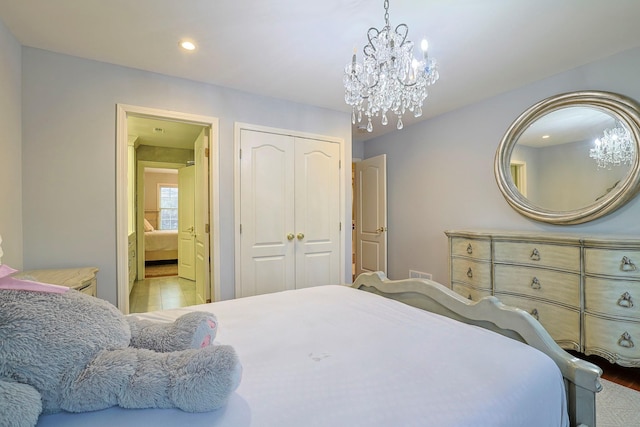 bedroom featuring a chandelier, a closet, and recessed lighting