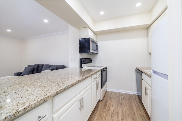 kitchen with appliances with stainless steel finishes, white cabinetry, light stone countertops, light wood-type flooring, and baseboards