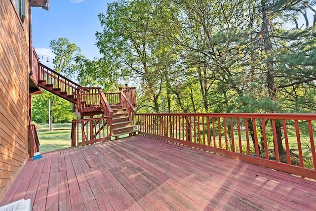 wooden terrace featuring stairs