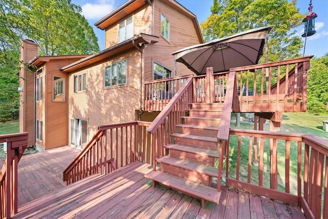 wooden terrace featuring stairs