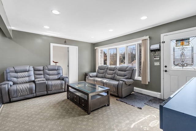 carpeted living area featuring baseboards, baseboard heating, and recessed lighting