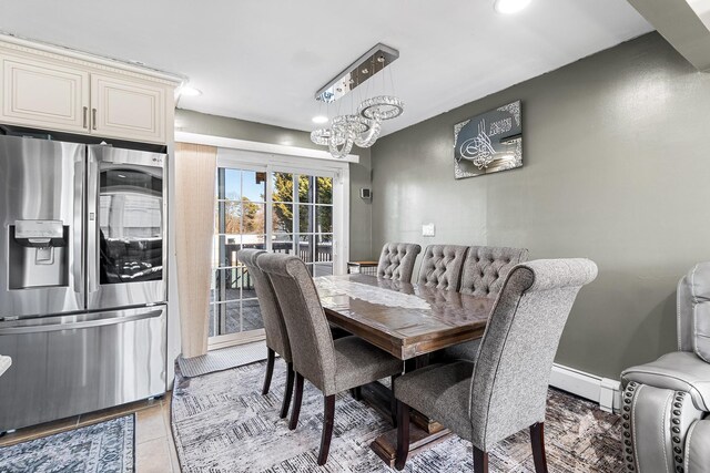 dining area featuring a chandelier, recessed lighting, light tile patterned flooring, and baseboards