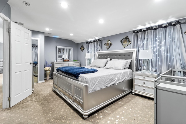 bedroom featuring carpet floors, recessed lighting, visible vents, and lofted ceiling