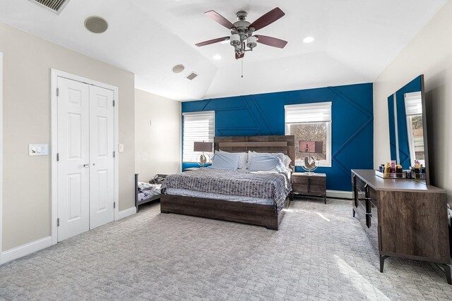 bedroom with baseboards, a closet, visible vents, and carpet flooring