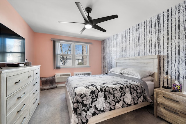 bedroom featuring ceiling fan, an accent wall, carpet flooring, a wall mounted AC, and wallpapered walls