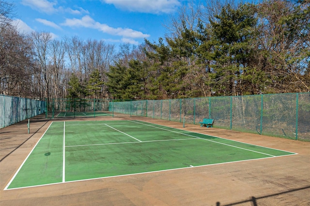 view of sport court featuring fence and community basketball court