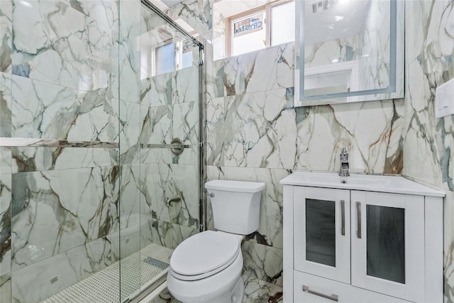 full bathroom featuring visible vents, a marble finish shower, and toilet