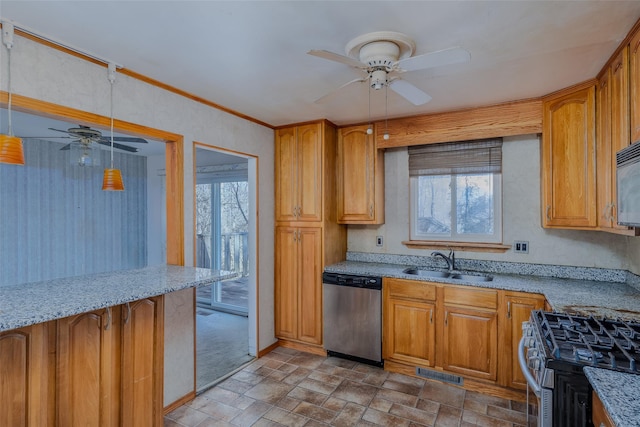 kitchen featuring a healthy amount of sunlight, visible vents, appliances with stainless steel finishes, and a sink