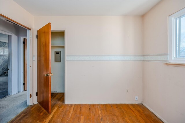 empty room featuring wood finished floors