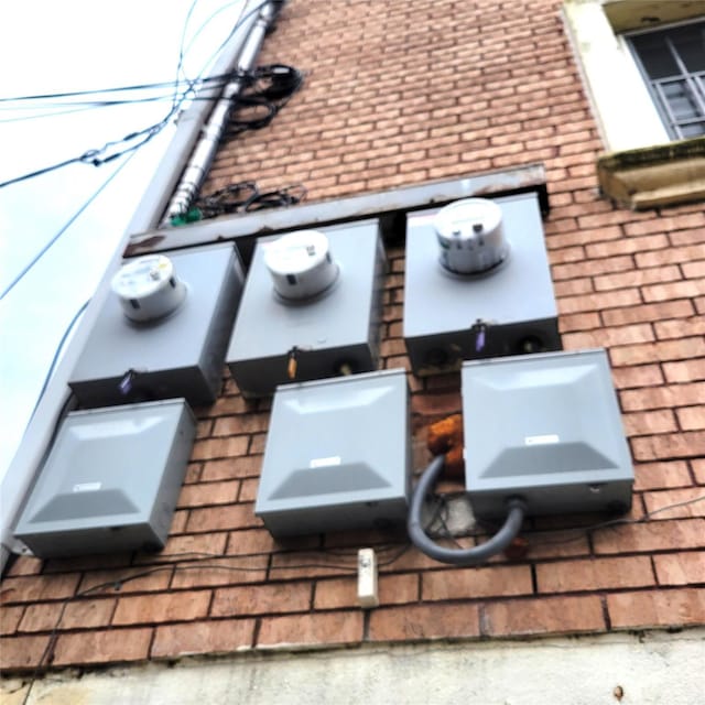 exterior details featuring electric meter