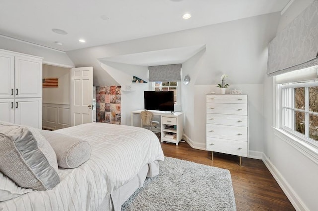 bedroom with dark wood-style floors, recessed lighting, baseboards, and vaulted ceiling