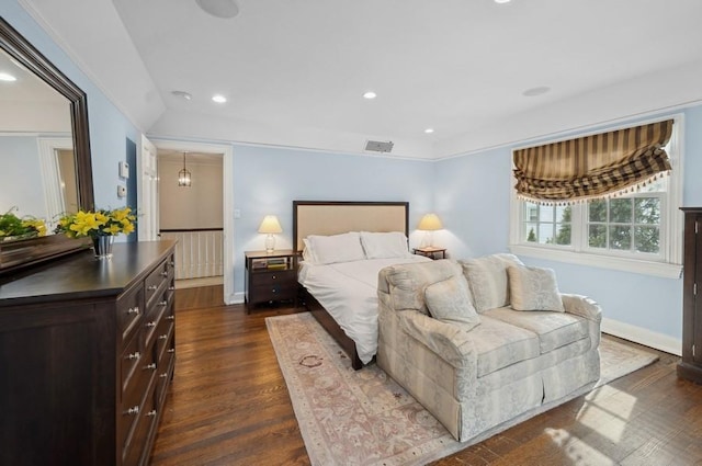 bedroom featuring recessed lighting, visible vents, baseboards, and dark wood finished floors