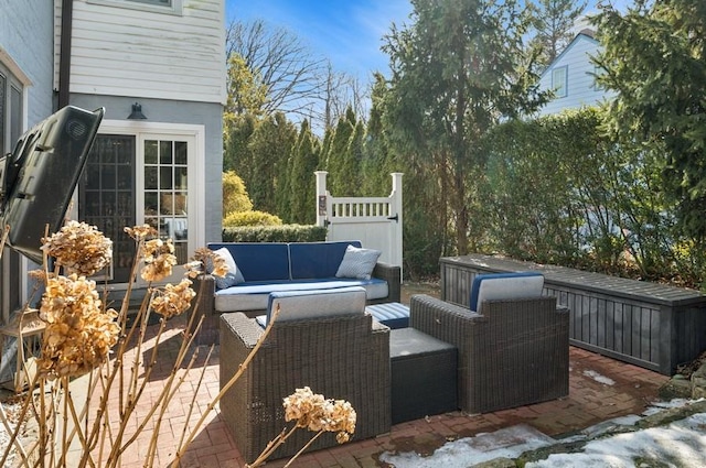 view of patio with outdoor lounge area and fence