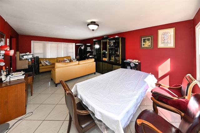 dining area with light tile patterned floors