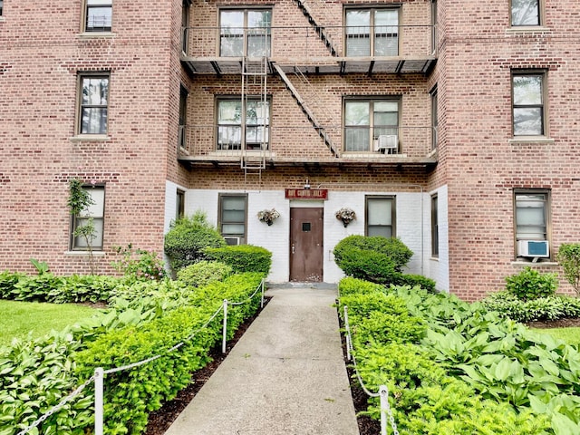 property entrance with brick siding