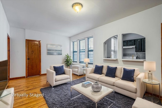 32-05 81st St Unit A3, Jackson Heights, NY 11370 - living area featuring wood finished floors and baseboards