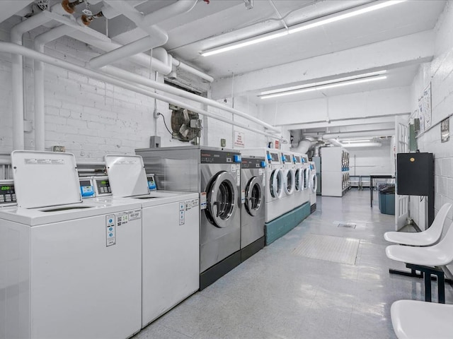 common laundry area with washer and clothes dryer