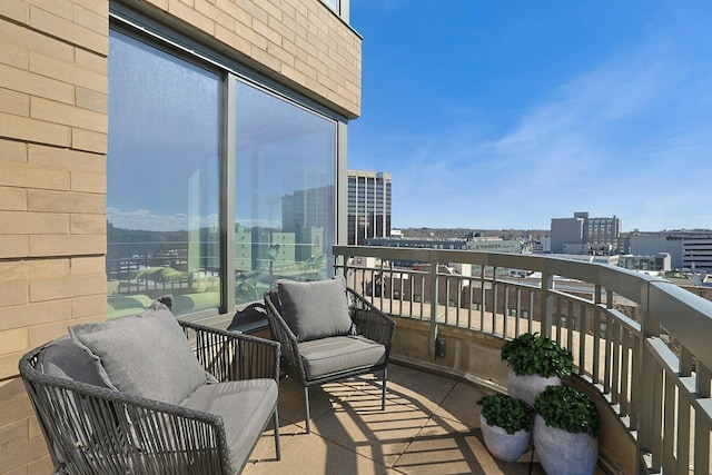 balcony featuring a view of city