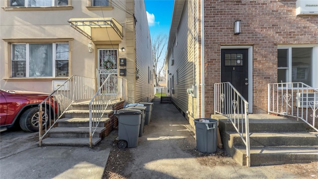 entrance to property with brick siding