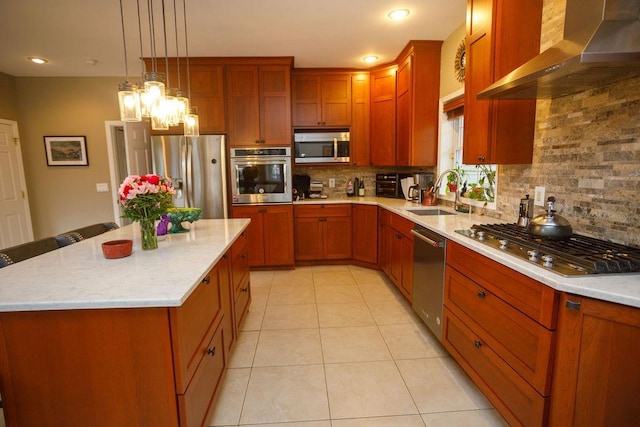 kitchen featuring light tile patterned floors, wall chimney exhaust hood, appliances with stainless steel finishes, a sink, and backsplash