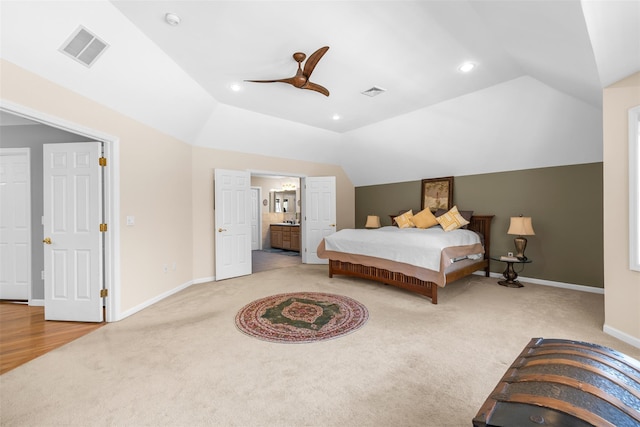 carpeted bedroom with vaulted ceiling, recessed lighting, visible vents, and baseboards