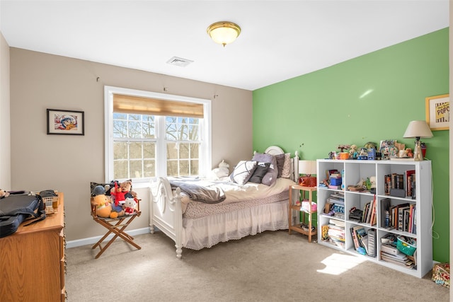 bedroom featuring carpet flooring, visible vents, and baseboards