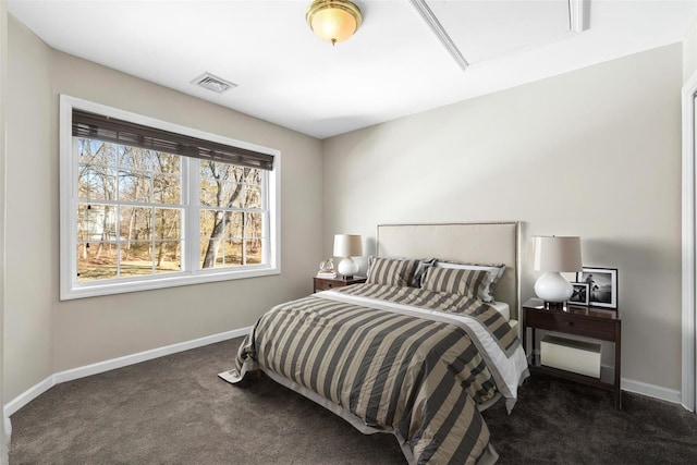 carpeted bedroom with baseboards and visible vents