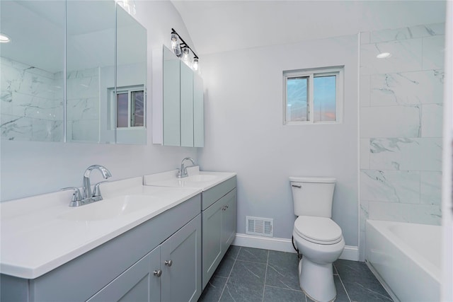 full bath featuring toilet, double vanity, a sink, and visible vents