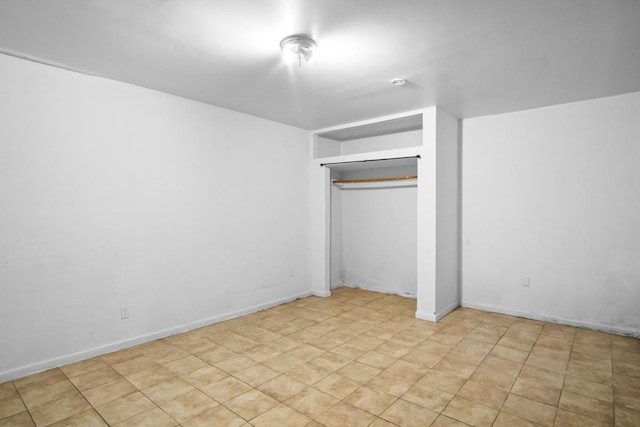 unfurnished bedroom featuring baseboards