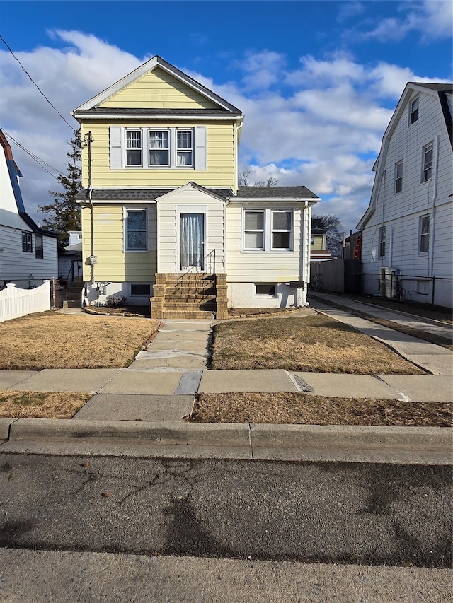 view of front of house with fence